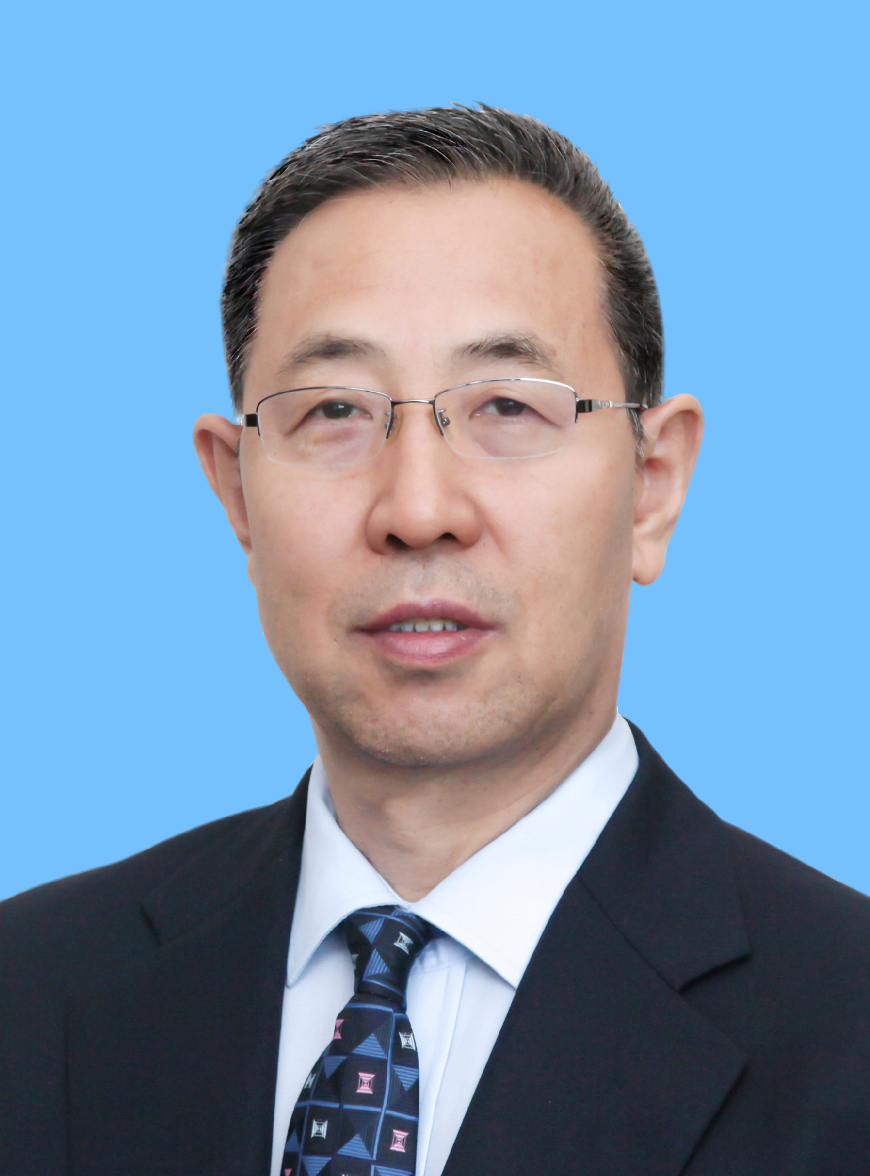 張來勇2吋藍色背景照片.jpg